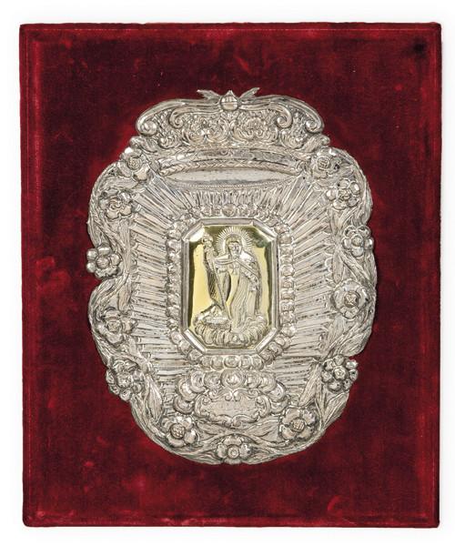  Placa de plata en su color y parcialmente dorada con San Antón, fechada "Ano 1814".