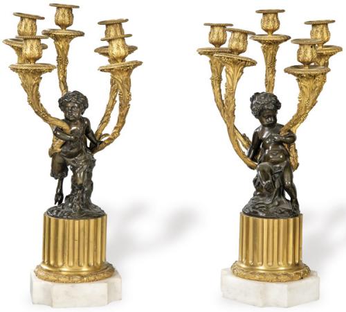 Pareja de candelabros con vástago de fauno y niño