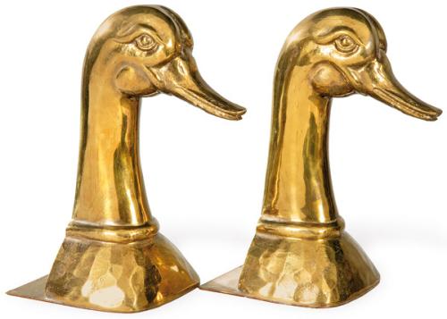 Pareja de sujeta-puertas de bronce dorado en forma de cabeza de pato de Almazán.