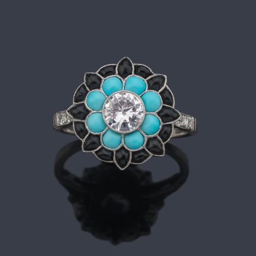  Anillo con diseño de flor con brillante central de aprox. 0,43 ct con piezas de turquesas y ónix.