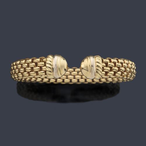  Pulsera con diseño de malla realizado en montura de oro amarillo de 18K.