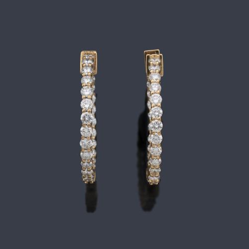  Criollas con banda de brillantes de aprox. 2,45 ct en total.