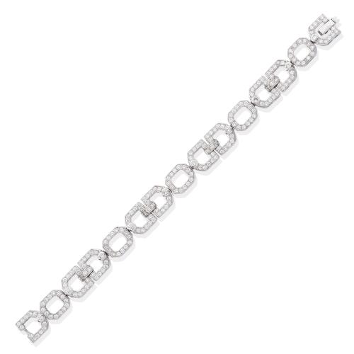  Pulsera con eslabones en repetición con brillantes de aprox. 6,25 ct en total unidos por brillantes engastados en chatón de aprox. 0,91 ct en total.