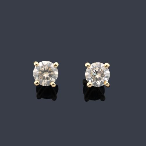  Dormilonas con pareja de brillantes de aprox. 1,01 ct en total. Certificado GCI.