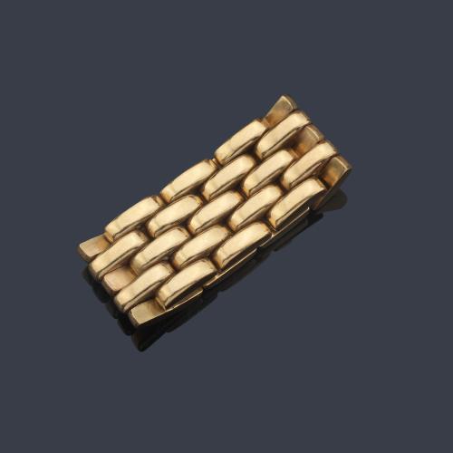  Anillo articulado con eslabones tipo 'panthère' en montura de oro amarillo de 18K.