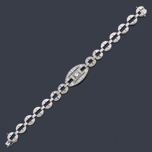 Pulsera con diamantes talla brillante y 16/16 en montura de platino y oro blanco de 18K.