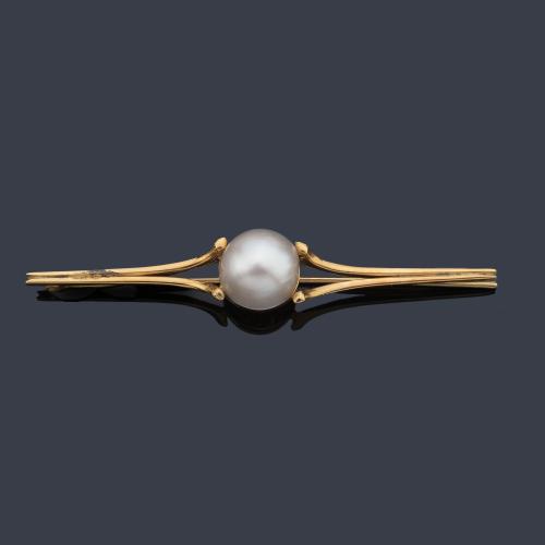 Broche - barrita con perla Mabe en montura de oro amarillo de 18K.