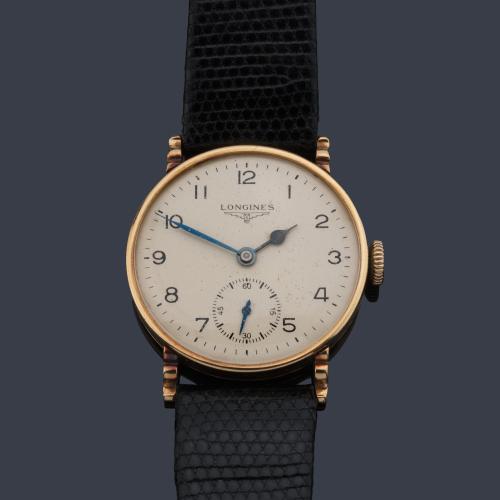  LONGINES de caballero con caja en oro amarillo de 18 K.