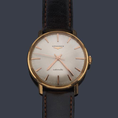  LONGINES de caballero con caja en oro amarillo de 18 K.