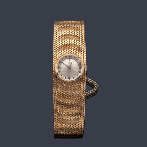  TISSOT de señora con caja y brazalete en oro rosa de 18 K.