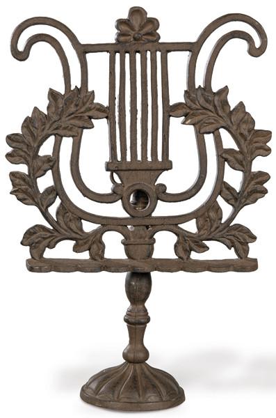  Atril de mesa en hierro colado en forma de lira.