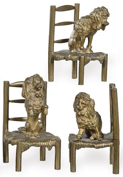  "Tres Caniches Sentados en Sillas" en bronce dorado ff. S. XIX.
