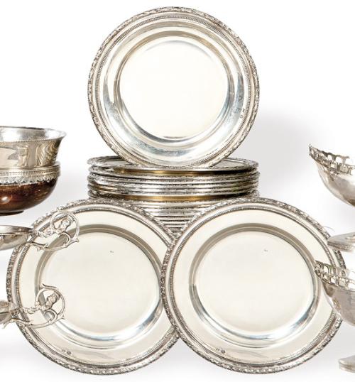 Juego de 19 platos de pan de plata española punzonada 1ª Ley de Montejo con marca comercial de Pérez Fernández.