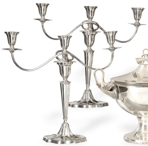 Pareja de candelabros convertibles en candelero de plata española punzonada 1ª Ley de Espuñes.