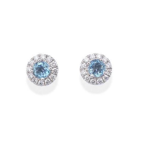  Pendientes cortos con dos aguamarinas talla redonda de aprox. 0,73 ct y orla de brillantes de 0,34 ct en total.