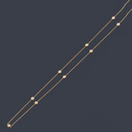 Cadena con once brillantes engastados en chatón de aprox. 0,55 ct en total.