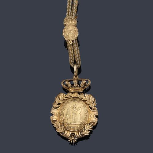 Medalla de la Real Academia de la Historia en plata dorada, sig. XIX.
