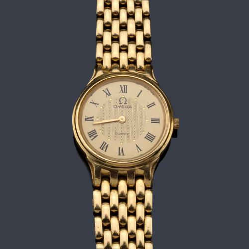 OMEGA de mujer con caja y brazalete en oro amarillo de 18 K.
