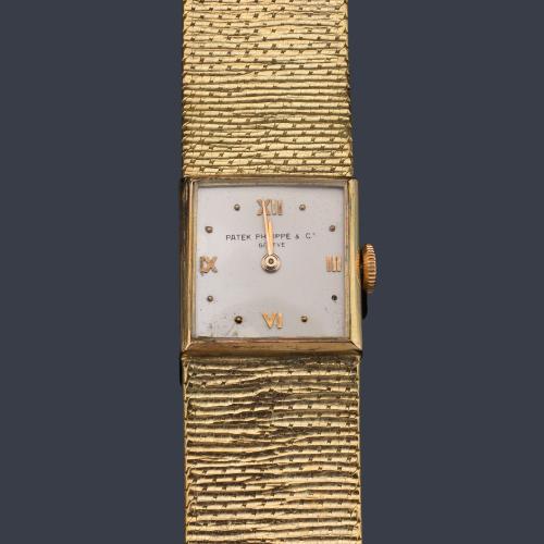 PATEK PHILIPPE de señora con caja y brazalete en oro amarillo de 18 K