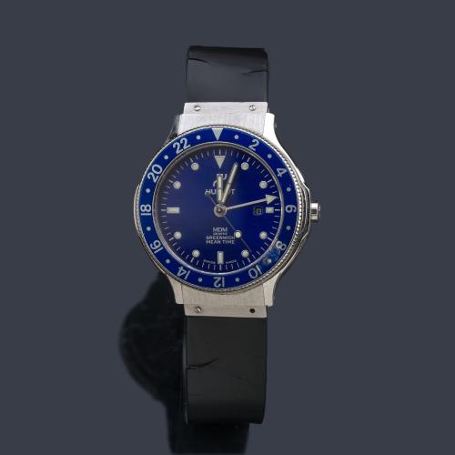 HUBLOT CLASSIC MDM Greenwich Mean Time ref. 1472.1 modelo cadete con caja en acero.