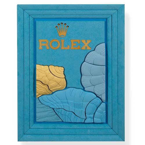  Escaparate ROLEX decorado con flores en tonos azules y beige, años aproximados 2000 -2010.