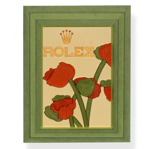  Escaparate ROLEX decorado con flores en tonos verdes, ocres y beige, años aproximados 2000 -2010.