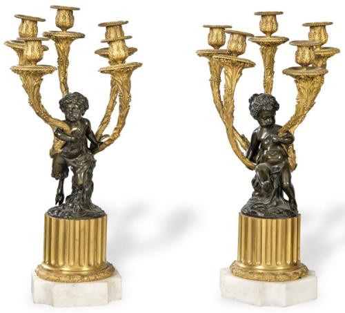  Pareja de candelabros de bronce dorado y patinado y mármol blanco, Francia S. XIX.