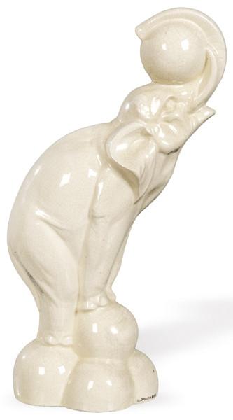  Figura de elefante Art decó, en cerámica esmaltada y craquelada en blanco de Marines. Con inscripción inferior “Marines France”.