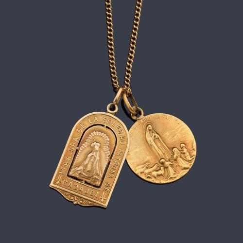  Cadena con dos medallas devocionales en oro amarillo de 18 K.