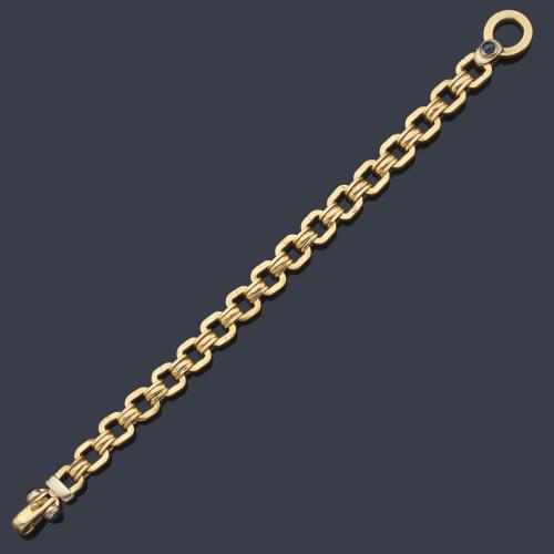  Pulsera en oro amarillo de 18 K y zafiros cabujón.