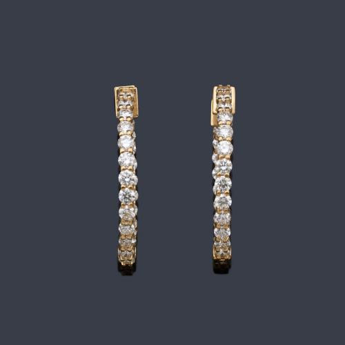  Criollas con banda de brillantes de aprox. 2,45 ct en total.