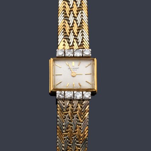  JEAN PERRET de señora con caja y brazalete en oro amarillo y blanco con brillantes.