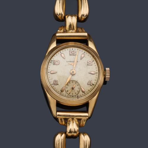  LONGINES de señora con caja y brazalete en oro amarillo de 18 K, años 40.