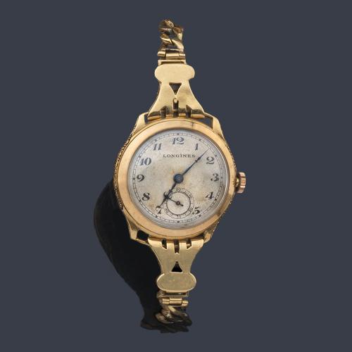  LONGINES, reloj de pulsera con caja y brazalete en oro amarillo de 18 K principios de siglo 20.