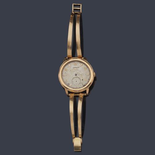  LONGINES (deteriorado) de caballero con caja y brazalete en oro amarillo de 18 K.