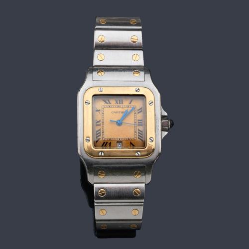  CARTIER Santos de caballero con caja y brazalete en acero y oro de 18 K. Con estuche.