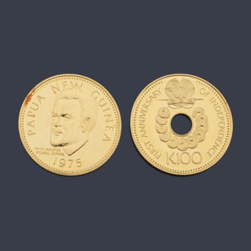  Dos monedas conmemorativas Papua Nueva Guinea en oro de 22 K.