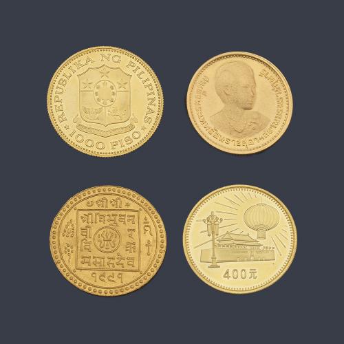  Cuatro monedas en oro de 22 K.