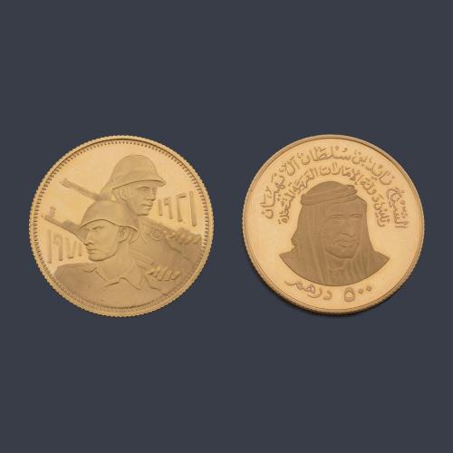  Dos monedas en oro de 22 K.