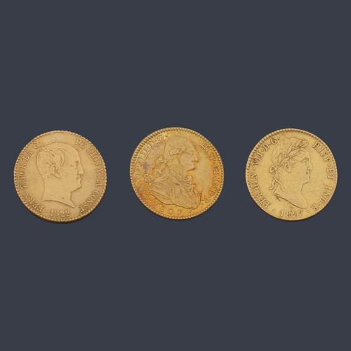  Tres monedas españolas en oro de 22 K.