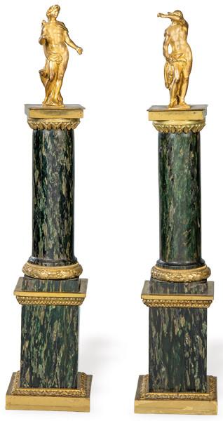  "Mercurio y Apolo" dos figuras italianas de bronce dorado del siglo XVIII, montadas sobre columnas de mármol y bronce del S. XIX