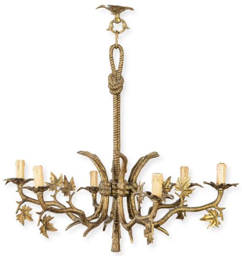  Lámpara de techo naturalista, de seis luces en metal patinado, con estructura formada por seis brazos en forma de ramas, con hojas lobuladas aplicadas y platillos foliares para los puntos de luz. Fuste central en forma de cuerda.