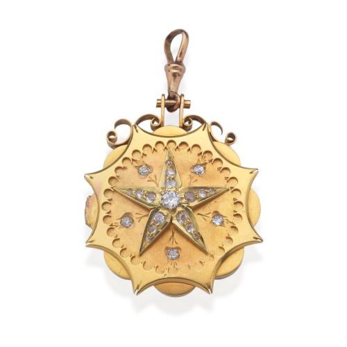  Colgante circular guardapelo en oro amarillo de 18K con motivo central en forma de estrella con diamantes talla antigua.