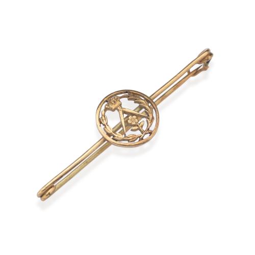  Alfiler con el emblema profesional de Arquitectura realizado en montura de oro amarillo de 18K.