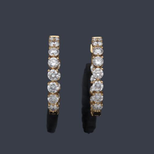  Criollas con banda de brillantes de aprox. 6,71 ct en total.