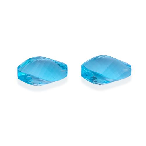  Pareja de topacios azules talla helicoidal de 43,11 ct.