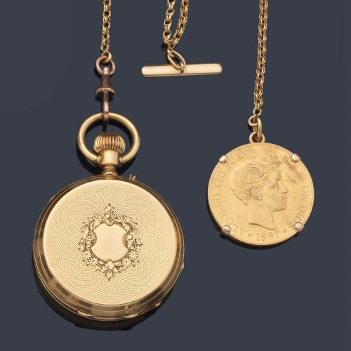 G.A. HUGUENIN & FILS nº 89301, reloj saboneta con caja en oro amarillo de 18 K y leontina con monedade Alfonso XIII en oro.