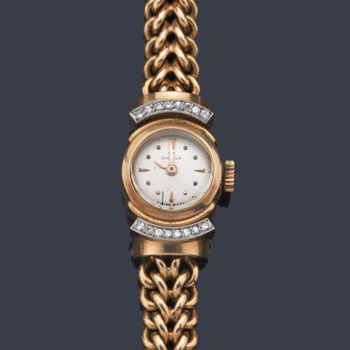  OMEGA de señora con caja y brazalete en oro rosa de 18 K con brillantes.