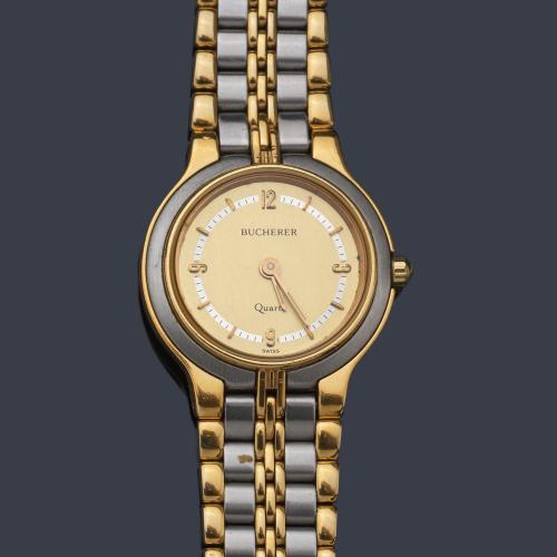  BUCHERER de señora con caja y brazalete en acero y oro de 18 K.