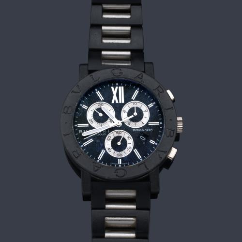  BVLGARI Carbongold Roma ref. BB38 CL CH serie limitada nº 013/999 de caballero con caja en carbono y oro blanco de 18 K, brazalete en acero y caucho.